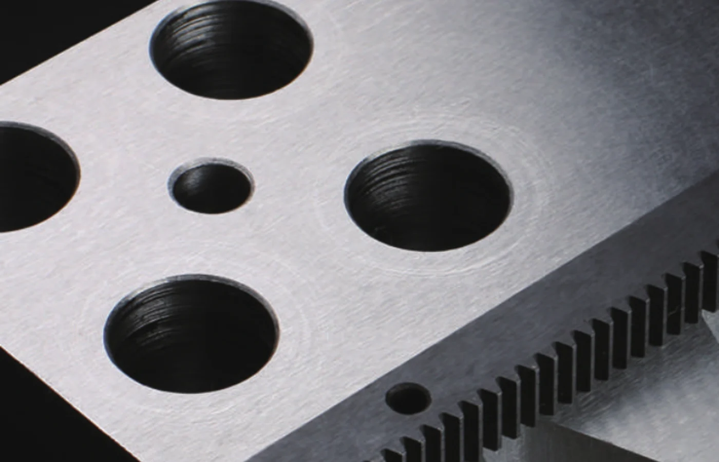 Close-up of helical rack tooth and mounting detail